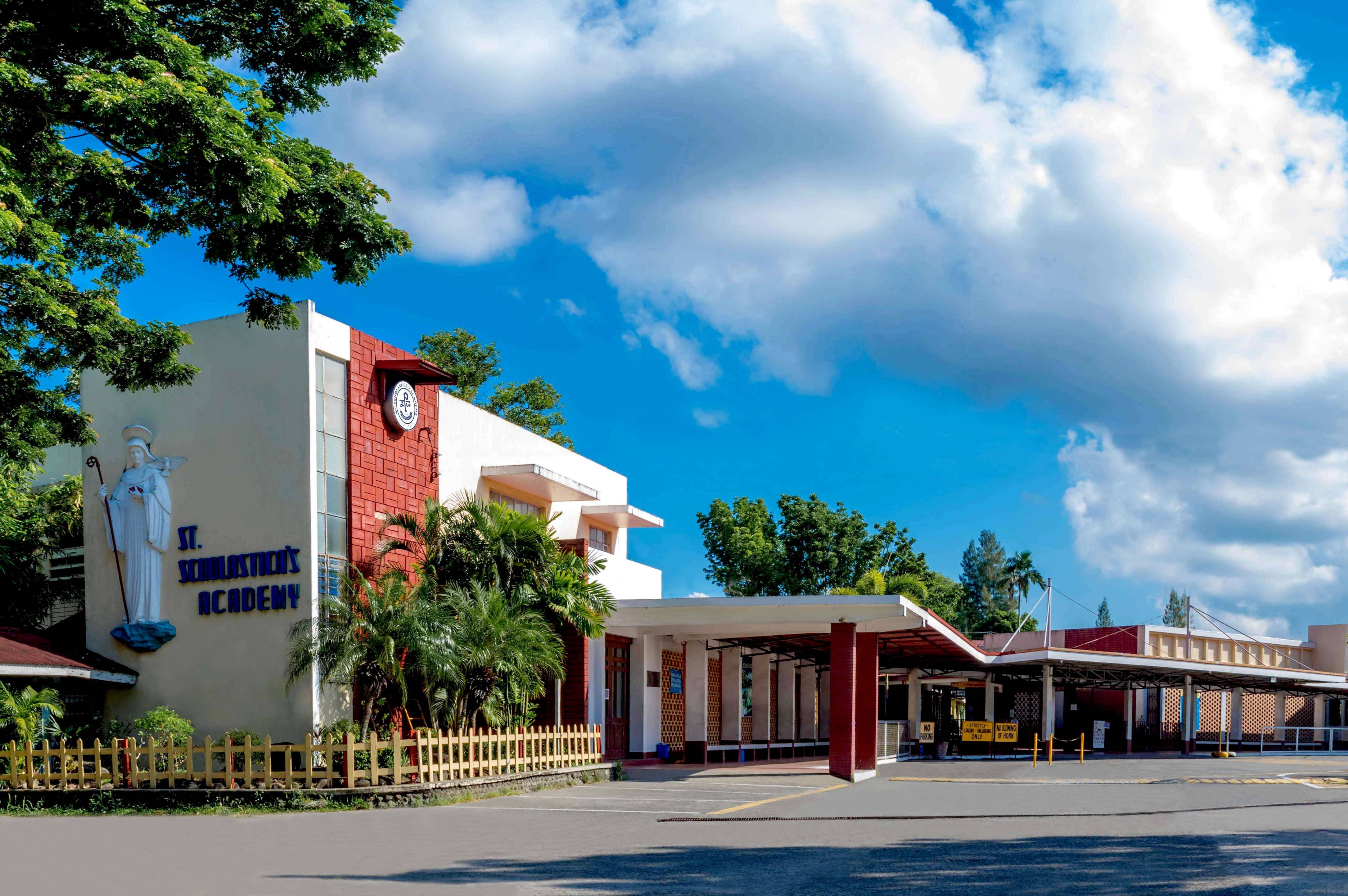 School campus with Mama Mary's statue